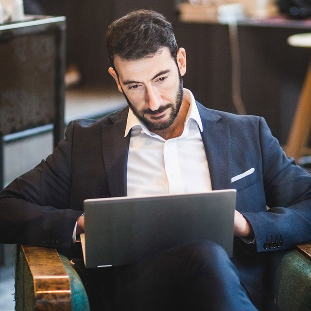 man using laptop